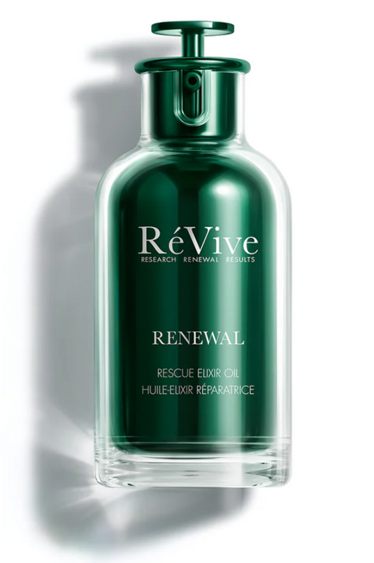 Green bottle of RéVive Renewal Rescue Elixir Oil on a white background